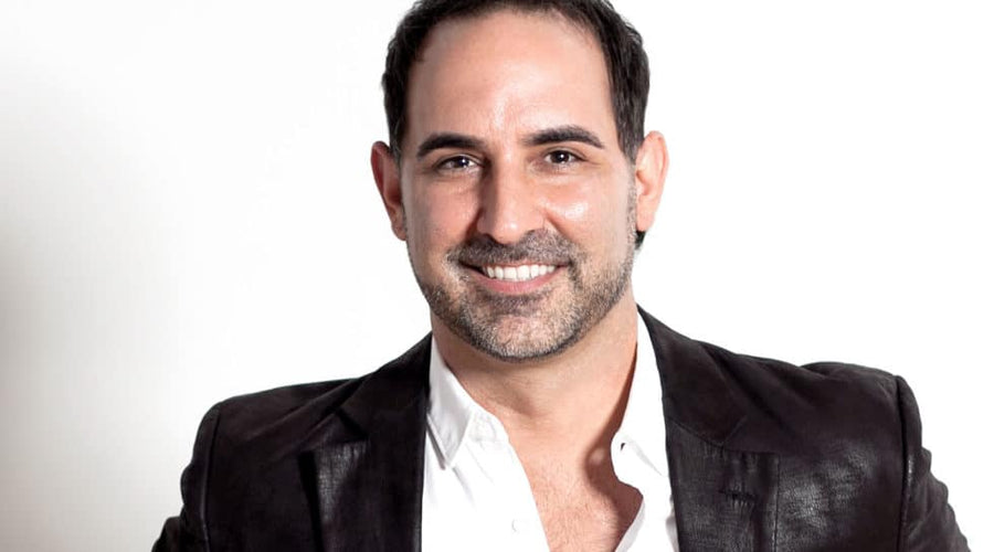 La sangre de Scott Bellina, nativo de Luisiana y graduado de LSU, corre profunda con púrpura, oro y salsa picante
